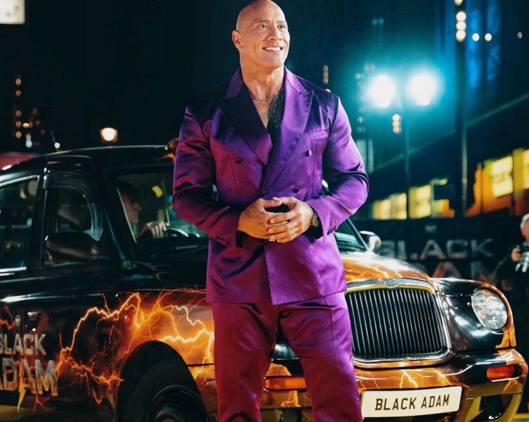 The Rock Dwayne Johnson Looks handsome in purple suit.